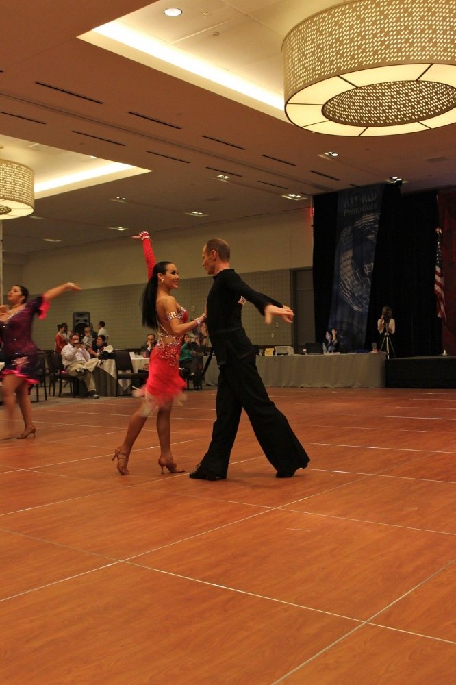 Elegant Ballroom Dancers competing