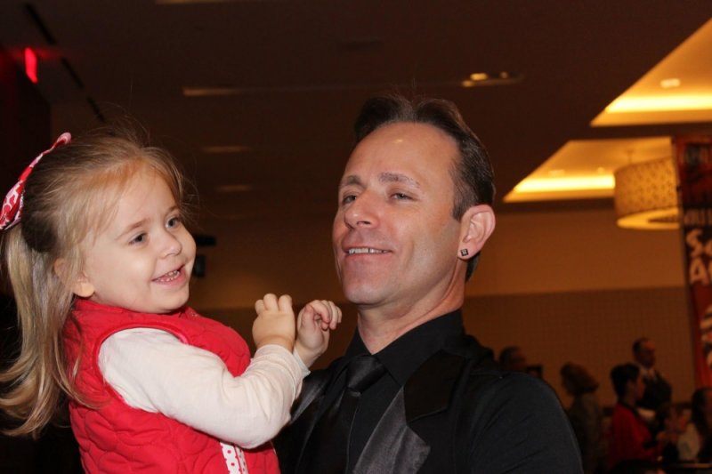 Father and daughter dancing